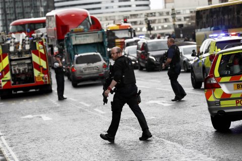 Armed police respond outside Parliament during an incident on Westminster Bridge in London